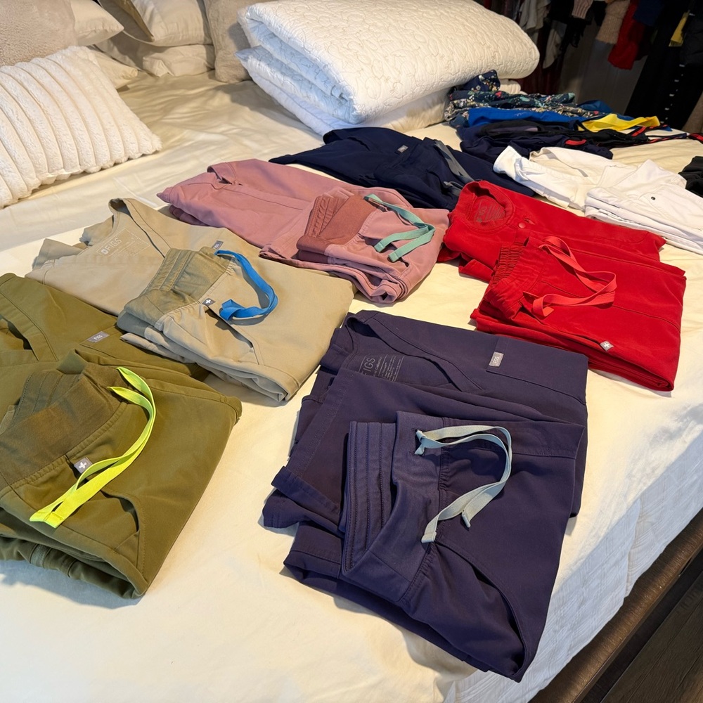 Figs Scrub Pants in Red, Pink, Blue, and Tan